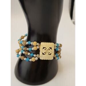 Boho Beaded Stretch Bracelet Carved Centerpiece Turquoise